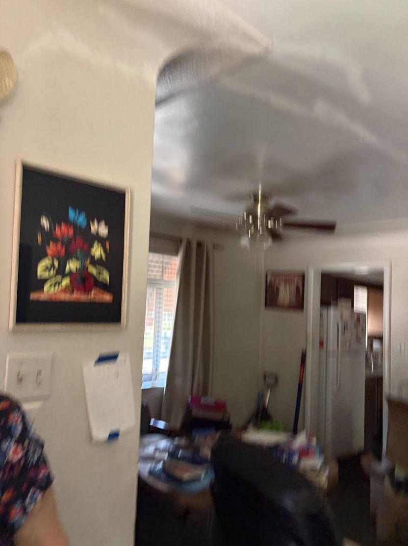 Occupied living room inside a Colorado home purchased as-is